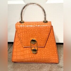 Badgley Mischka orange trapezoid vegan croc bag NWT